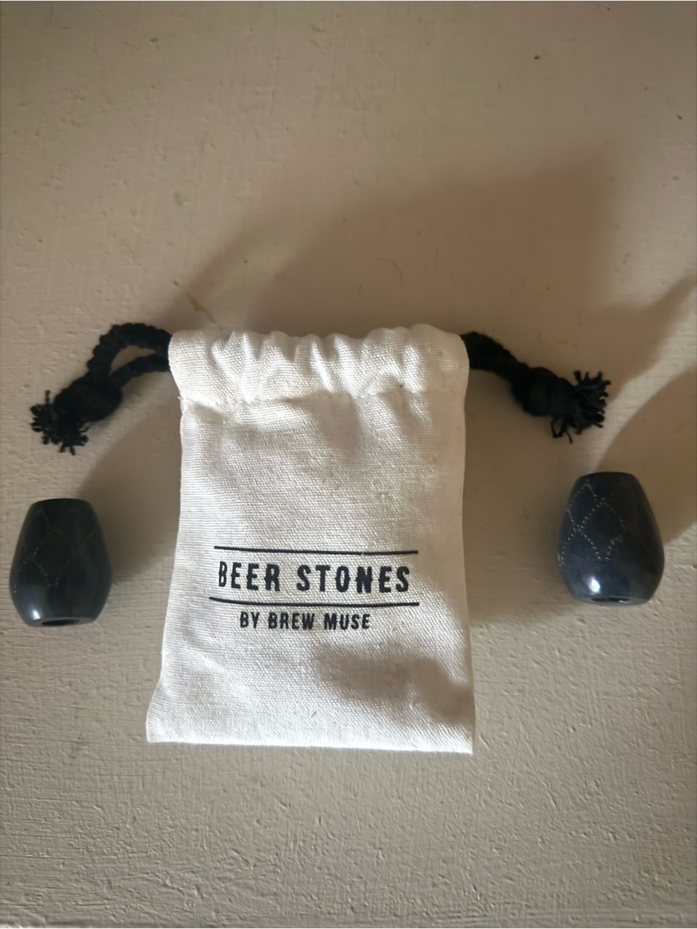 Gray Beer Stones with White Drawstring Pouch